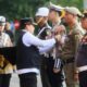Apel gabungan Kesiapan Pelaksanaan Operasi Lilin Musi 2024 di gelar di halaman Rumah Dinas Gubernur Griya Agung Palembang, Jumat (20/12/2024)