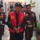 Mantan Wali Kota Palembang Harnojoyo digiring petugas Kejati Sumsel menuju mobil tahanan dibawa ke Lapas Pakjo Palmebang. Foto: ist/idsumsel.com
