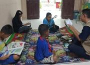 Dorong Minat Baca Sejak Dini, Mahasiswa Gelar Bimbel Membaca Sore di Desa Taraman Jaya