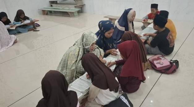 Mahasiswa KKN 03 Taraman Jaya Gelar Bimbingan Baca Al-Quran