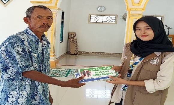 Penguatan Fasilitas Masjid: Pemasangan Batas Suci dan Penanda Arah Wudhu
