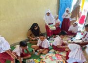 Revitalisasi Perpustakaan dan Penguatan Literasi Siswa Melalui Bimbingan Belajar Bahasa Inggris dan Matematika Kelas 4 di SDN 01 Karang Menjangan